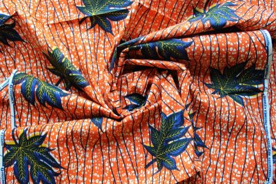 Tela africana wax, naranja, hojas